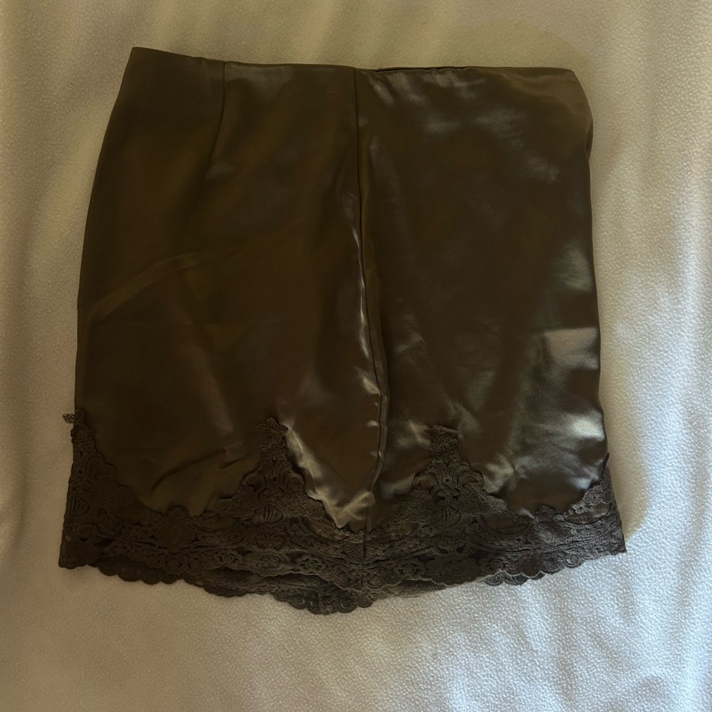 Olive colored mini with lace trim from Urban